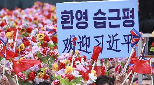 People welcome Xi Jinping in Pyongyang