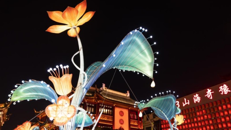 People watch lantern show at Yu Garden in Shanghai