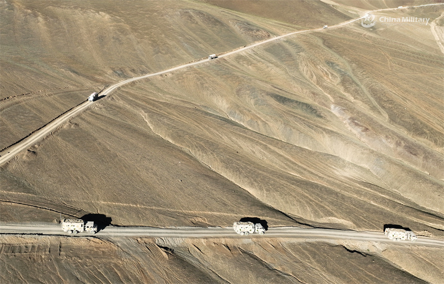 Military vehicles en route to designated area